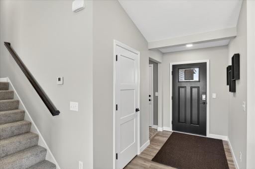 Entry - photos are of a staged model home of the same floorplan. Selections and colors may differ.