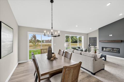 Dining area - photos are of a staged model home of the same floorplan. Selections and colors may differ.