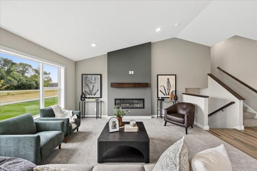 Living room - photos are of a staged model home of the same floorplan. Selections and colors may differ.