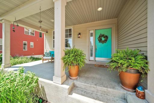 Inviting front porch perfect for relaxing!