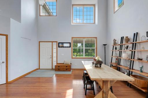 The grand two-story foyer creates a stunning first impression with soaring ceilings and an open, airy feel. The adjoining flex space is currently used as a formal dining room and home office but can easily be tailored to suit your needs.
