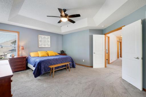 The impressive primary suite offers a peaceful retreat at the back of the home, complete with a private full bathroom and a large walk-in closet designed with both comfort and functionality in mind.