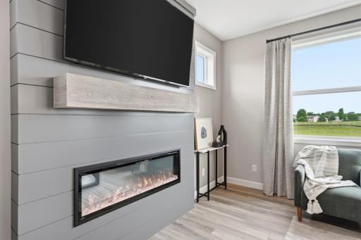Fireplace, shiplap, built in mantel - photos of a staged, completed model, of the same floorplan for illustrative purposes.