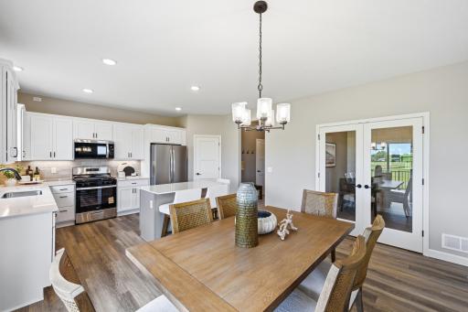Dining area - photos of a staged, completed model, of the same floorplan for illustrative purposes.