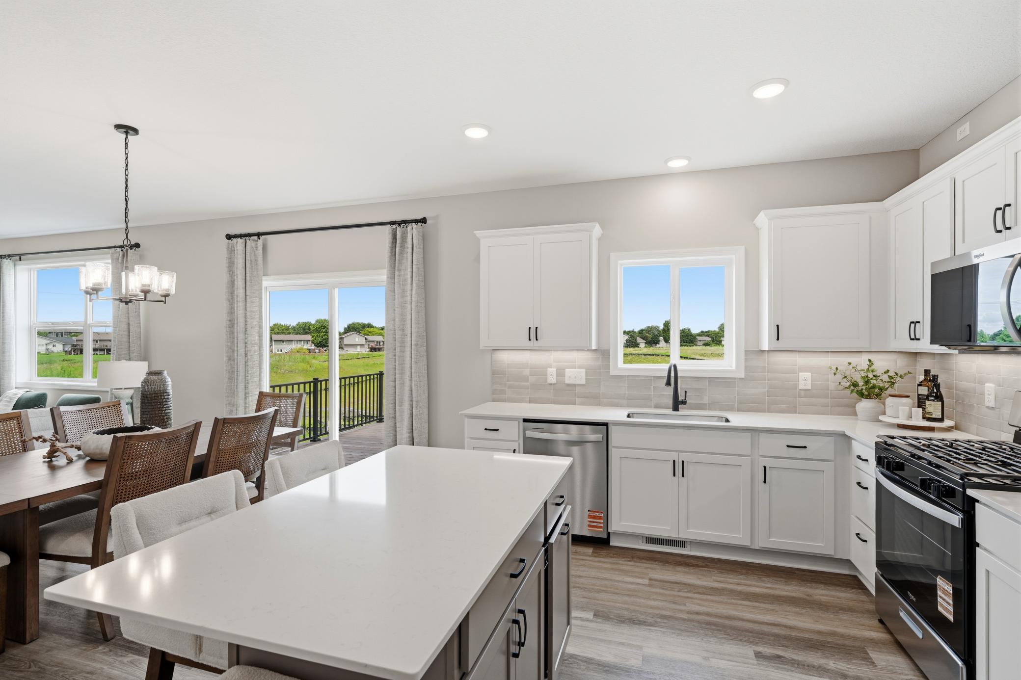 Kitchen - photos of a staged, completed model, of the same floorplan for illustrative purposes.