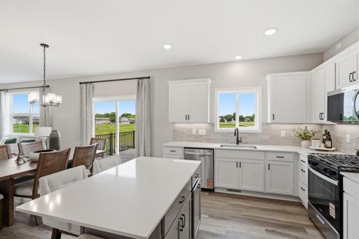 Kitchen - photos of a staged, completed model, of the same floorplan for illustrative purposes.