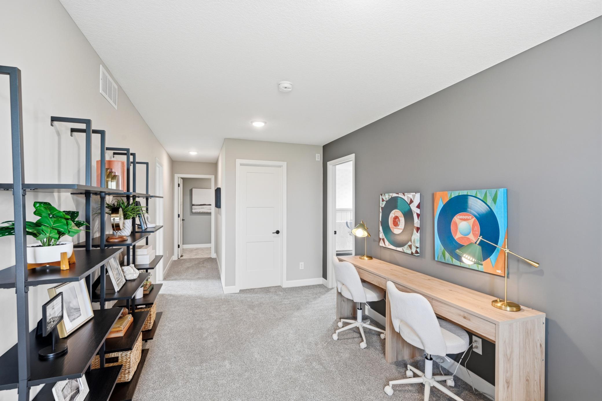 Upstairs loft - photos of a staged, completed model, of the same floorplan for illustrative purposes.