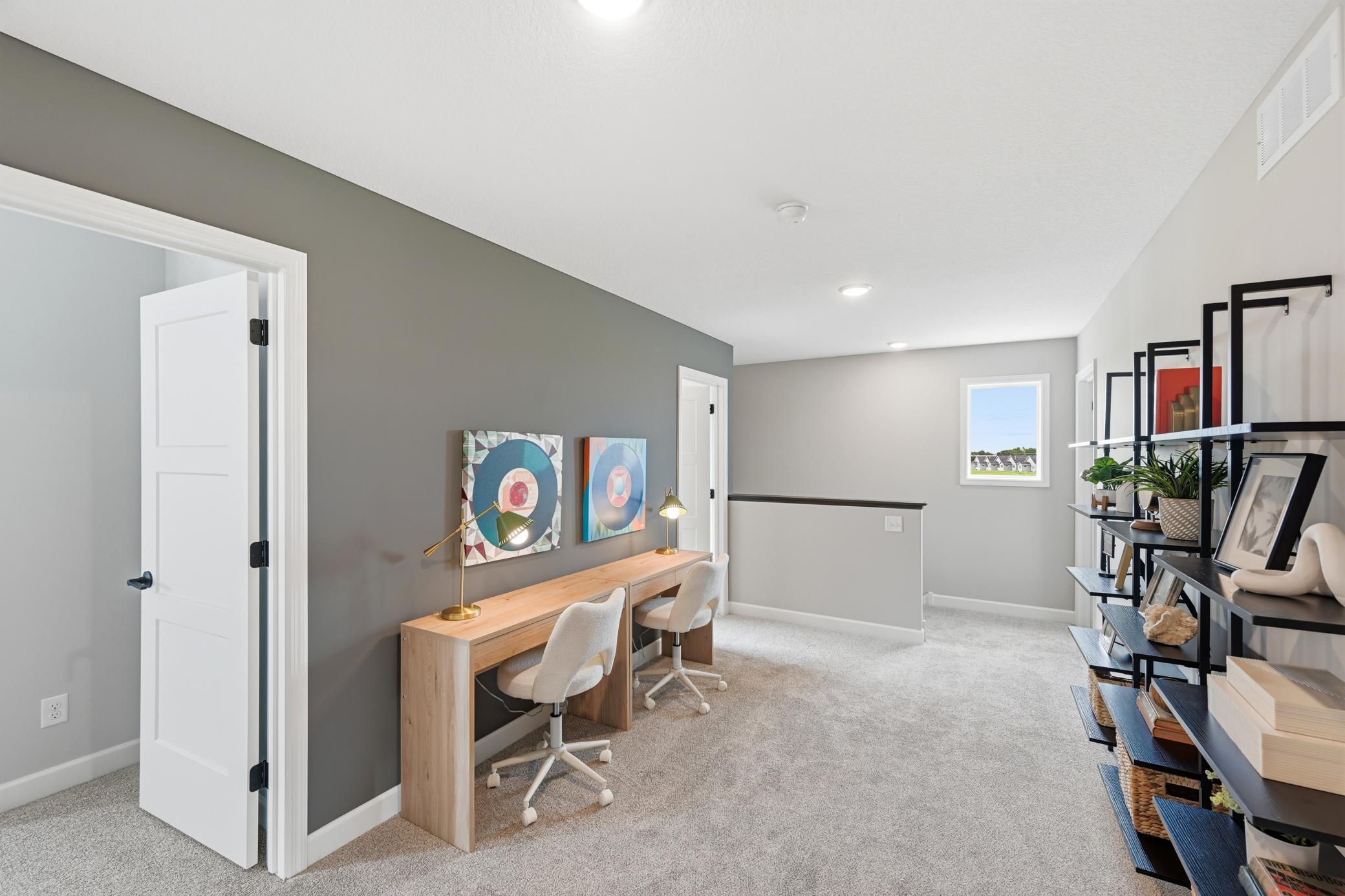 Upstairs loft - photos of a staged, completed model, of the same floorplan for illustrative purposes.