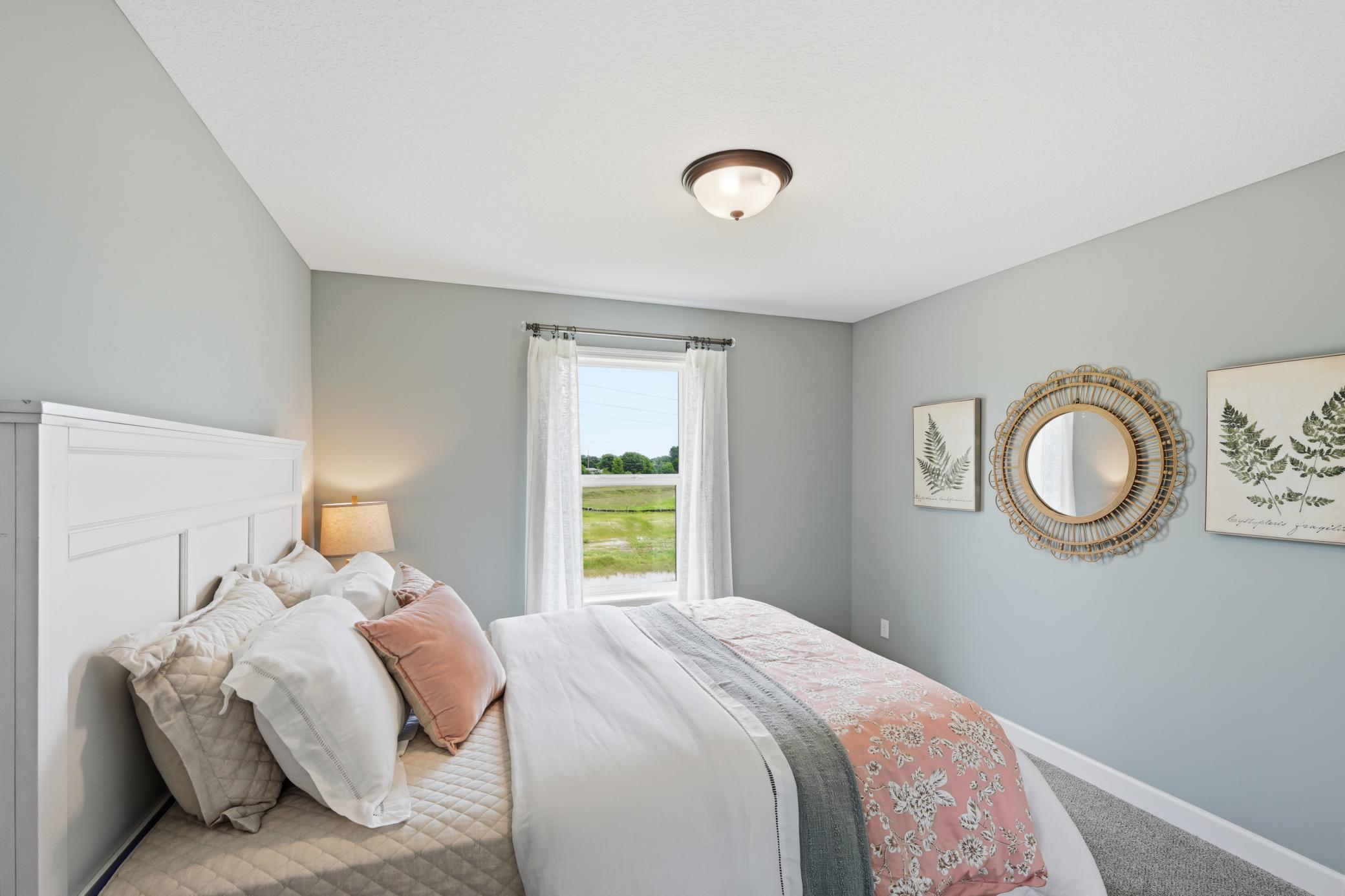 Bedroom 1 - photos of a staged, completed model, of the same floorplan for illustrative purposes.