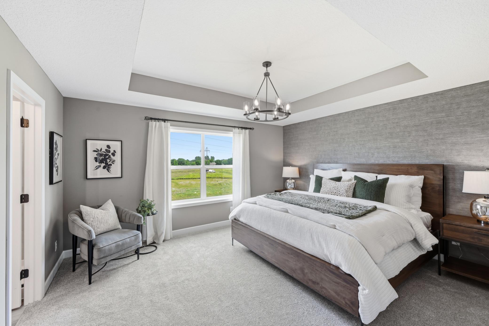 Primary suite - photos of a staged, completed model, of the same floorplan for illustrative purposes.