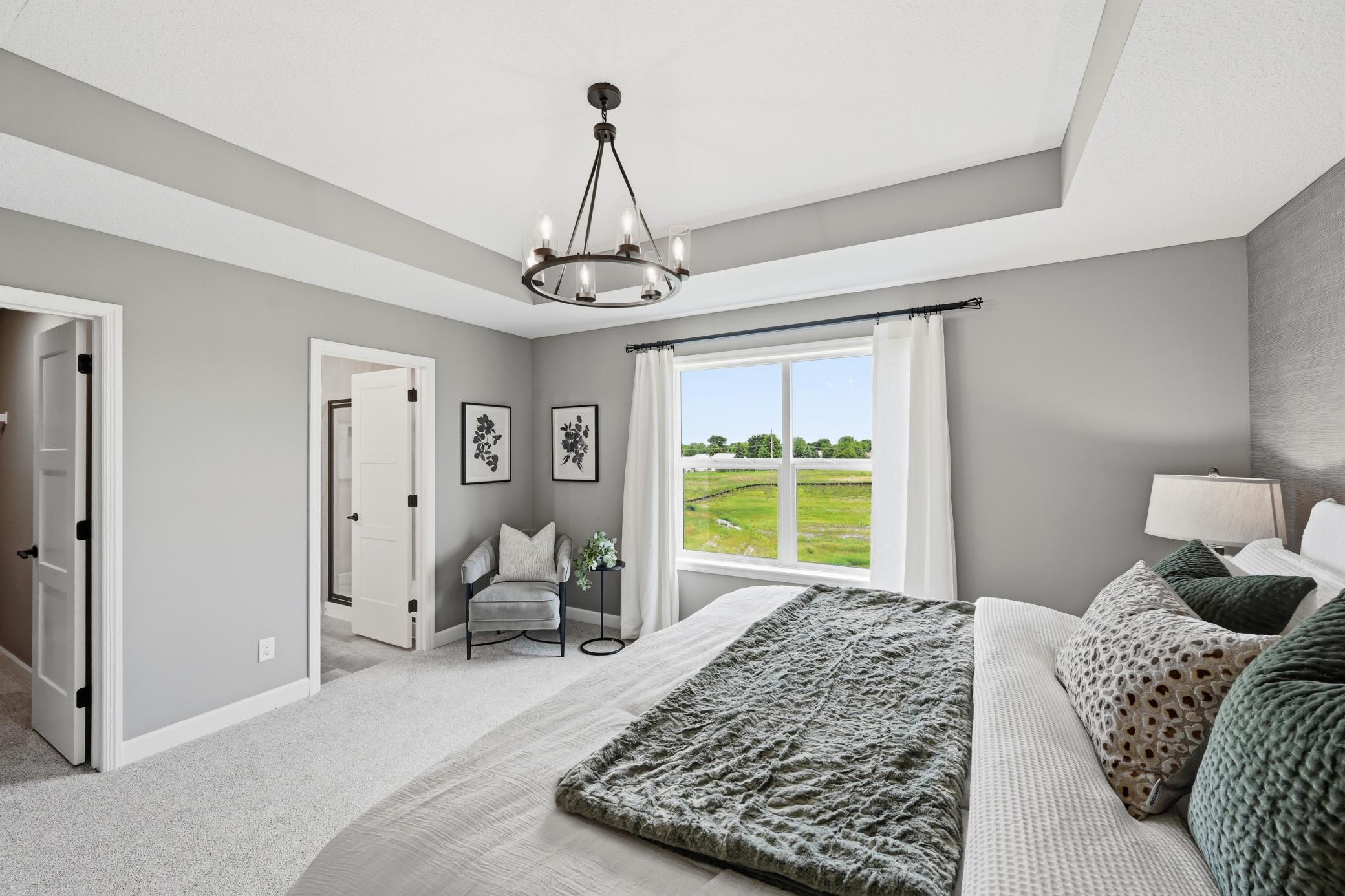 Primary suite - photos of a staged, completed model, of the same floorplan for illustrative purposes.