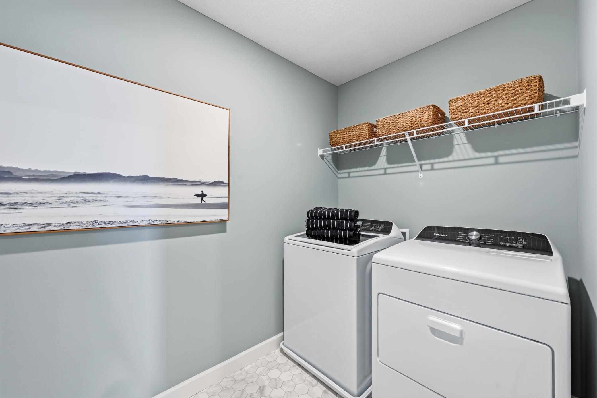 Laundry room - photos of a staged, completed model, of the same floorplan for illustrative purposes.
