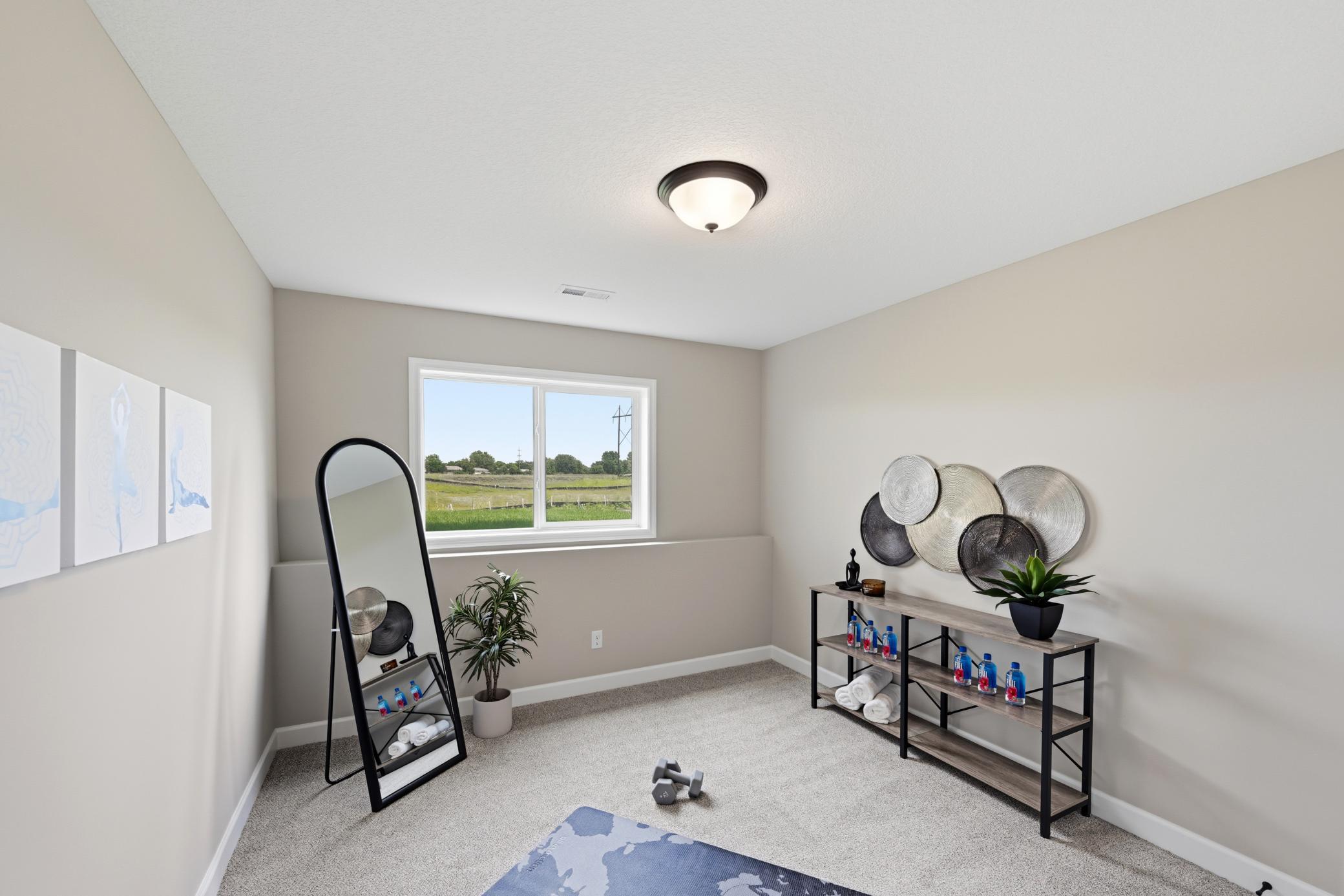 Bedroom 5 - photos of a staged, completed model, of the same floorplan for illustrative purposes.