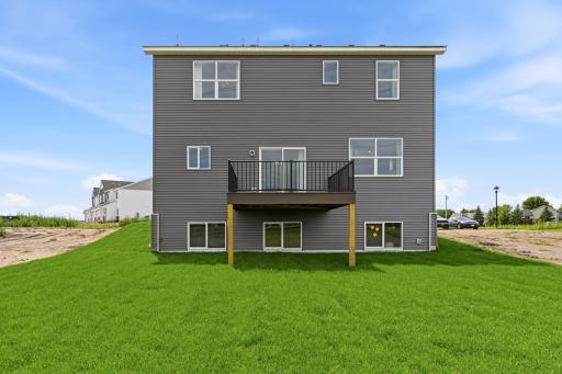 Rear view, lookout basement - photos of a staged, completed model, of the same floorplan for illustrative purposes.