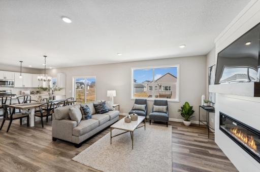 Living room - photo is of a staged model home of the same floorplan. Selections and colors may differ.