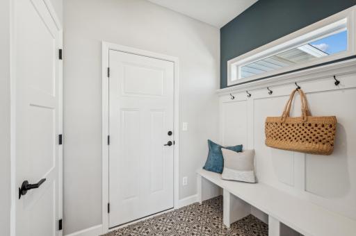 Mudroom - photo is of a staged model home of the same floorplan. Selections and colors may differ.