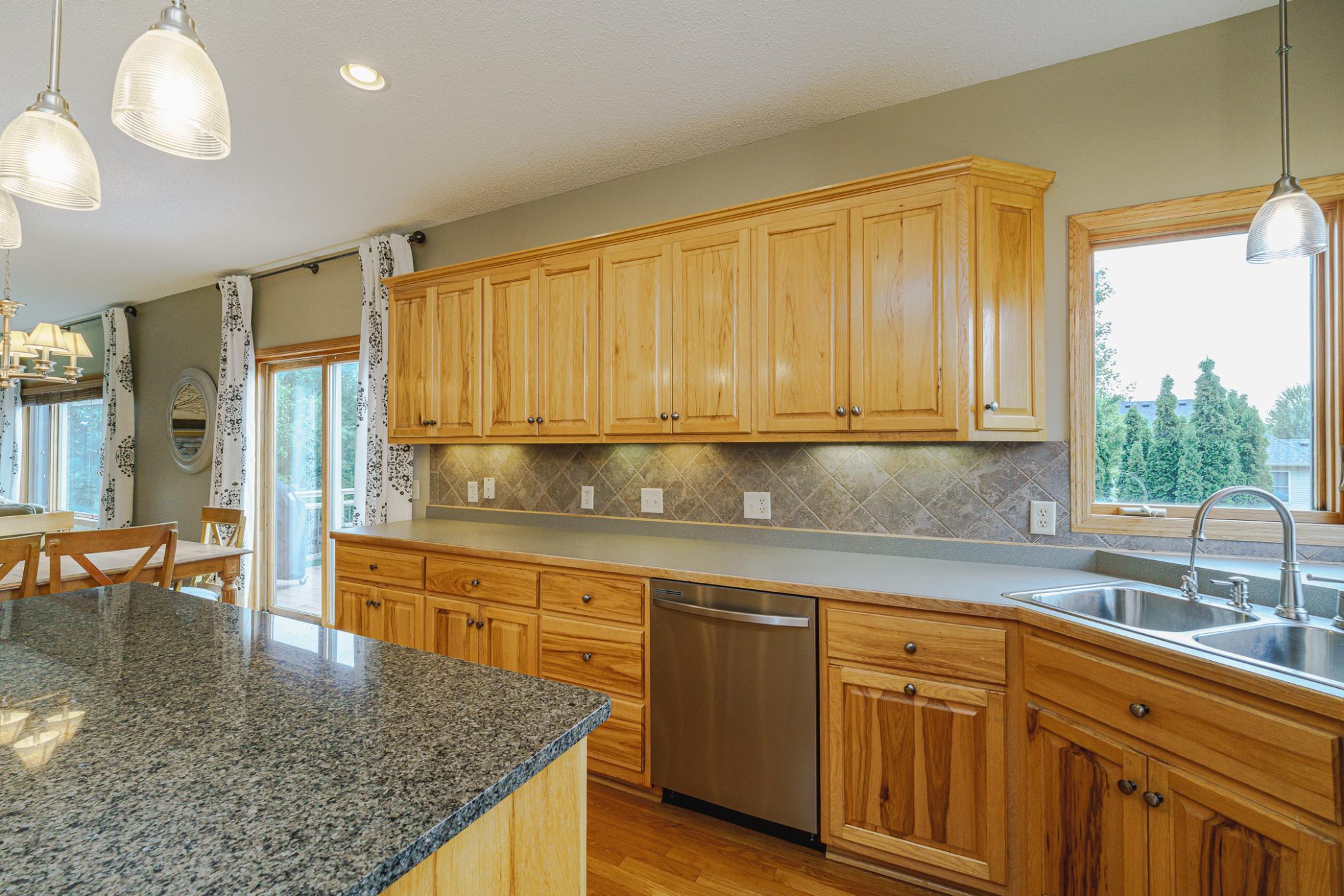 A tile backsplash dresses up this space, which also has updated stainless appliances. The dishwasher is new as of February 2026.