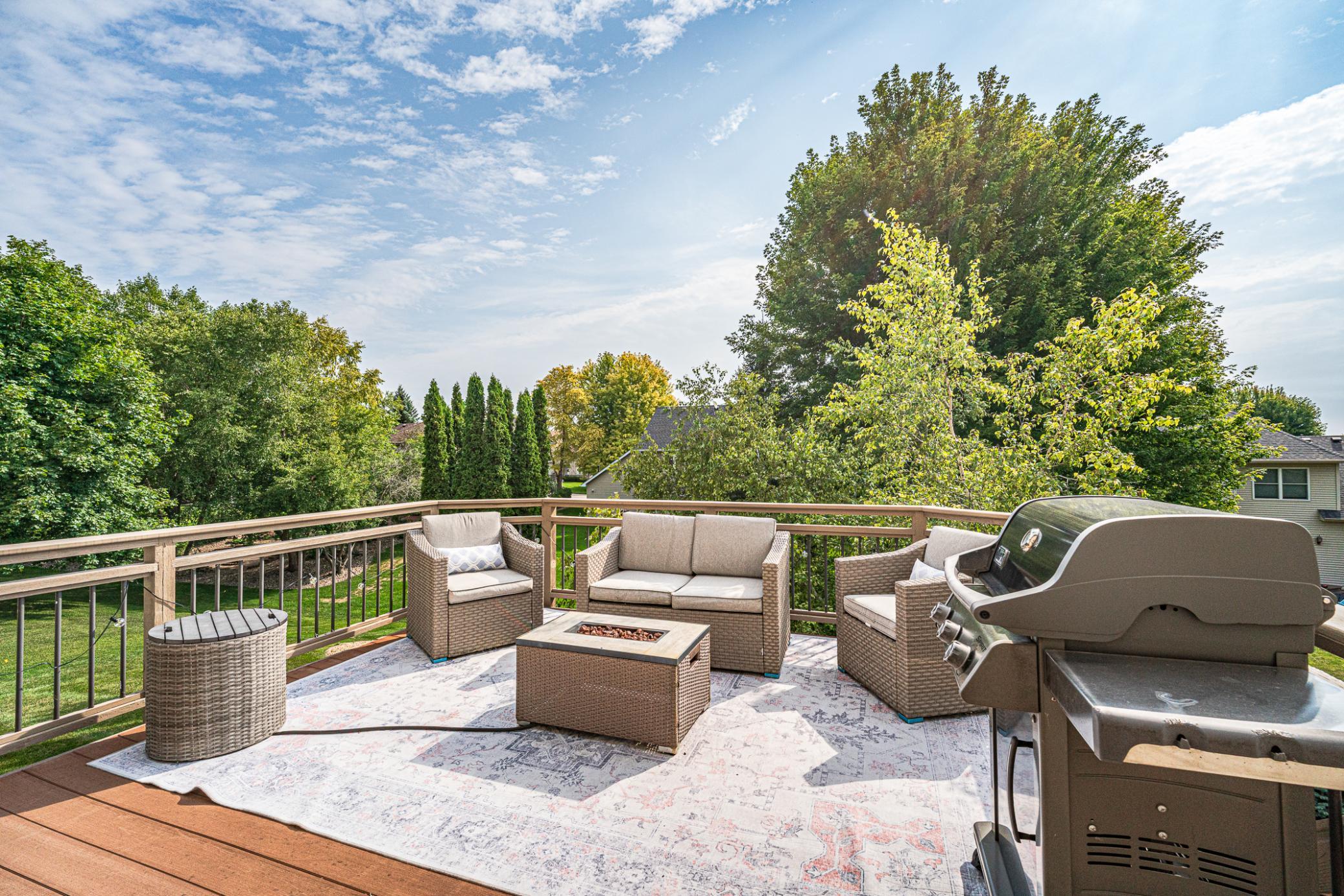 The composite deck offers a relaxing place to unwind! It has nice tree coverage for privacy.