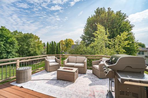 The composite deck offers a relaxing place to unwind! It has nice tree coverage for privacy.