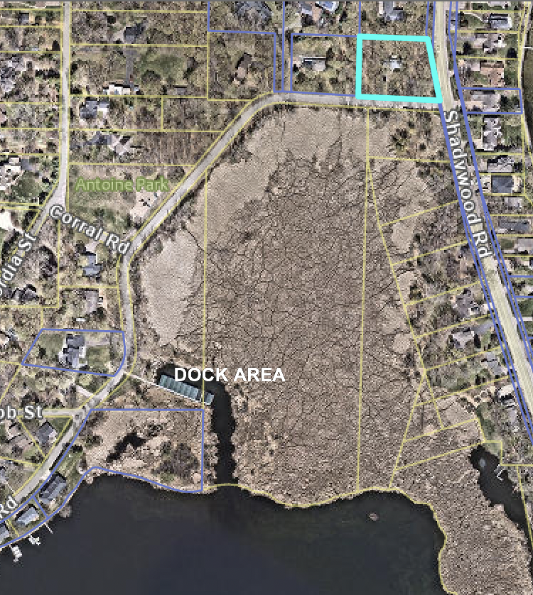 Noted shared DOCK AREA space in proximity to home. Short walk down the street.