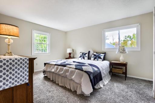 Primary Bedroom has two walk-in closets and a private 3/4 bath