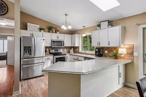 Enjoy a light and bright kitchen with the frameless infinity skylight.