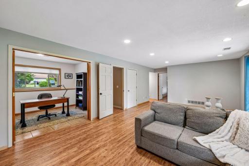 Large lower level flex room with french doors. Use it as an office, workout room, craft room, play room, etc!