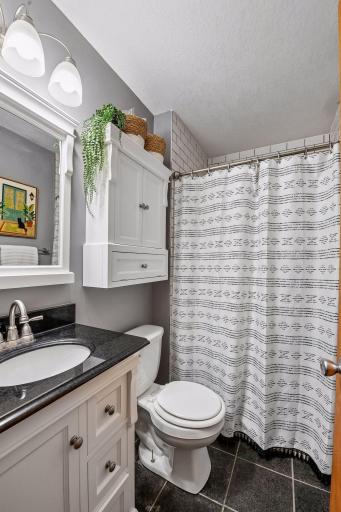 Owner's en-suite 3/4 bathroom with beautiful tiled shower.