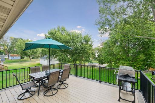 Oversized maintenance-free deck to enjoy dining al fresco.