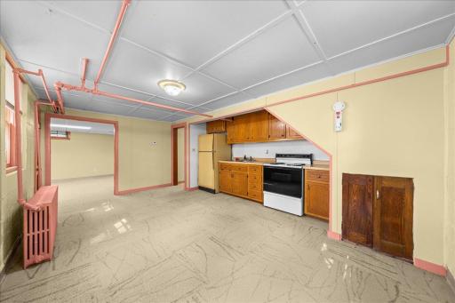 Lower level has a kitchenet, bedroom, and laundry