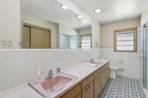 3/4 Bathroom on the Main Level with dual vanities