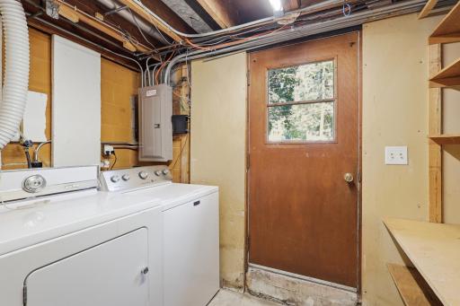 Laundry Room with door access to the property