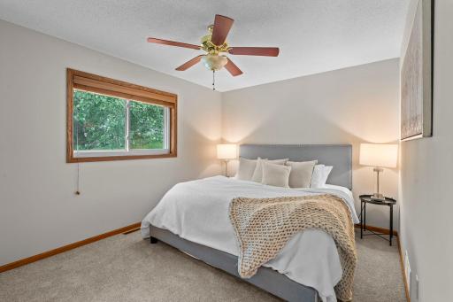Upper level primary bedroom overlooking back yard.