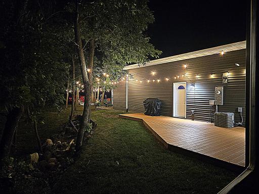 Ground level deck off the house/garage leads to your back yard oasis.