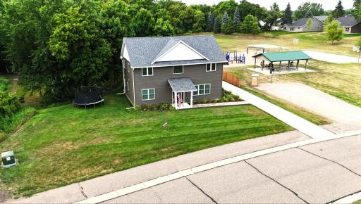Privacy fence between the playground and home. Pavilion shelter at park is a great spot if you have a get together