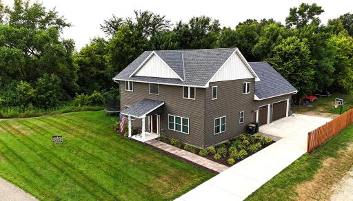 Surrounded by woods to the north and west, the backyard makes it feel like you are living on a private country setting.