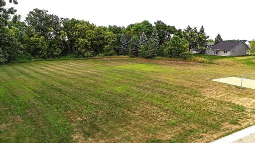 Large green space at the City park next door. Whiffle ball in the summer and football games in the fall