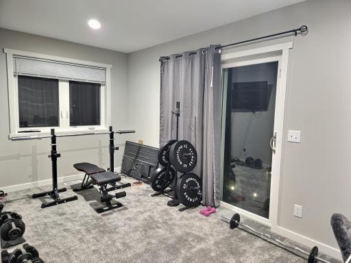 Flex room currently setup with weights
