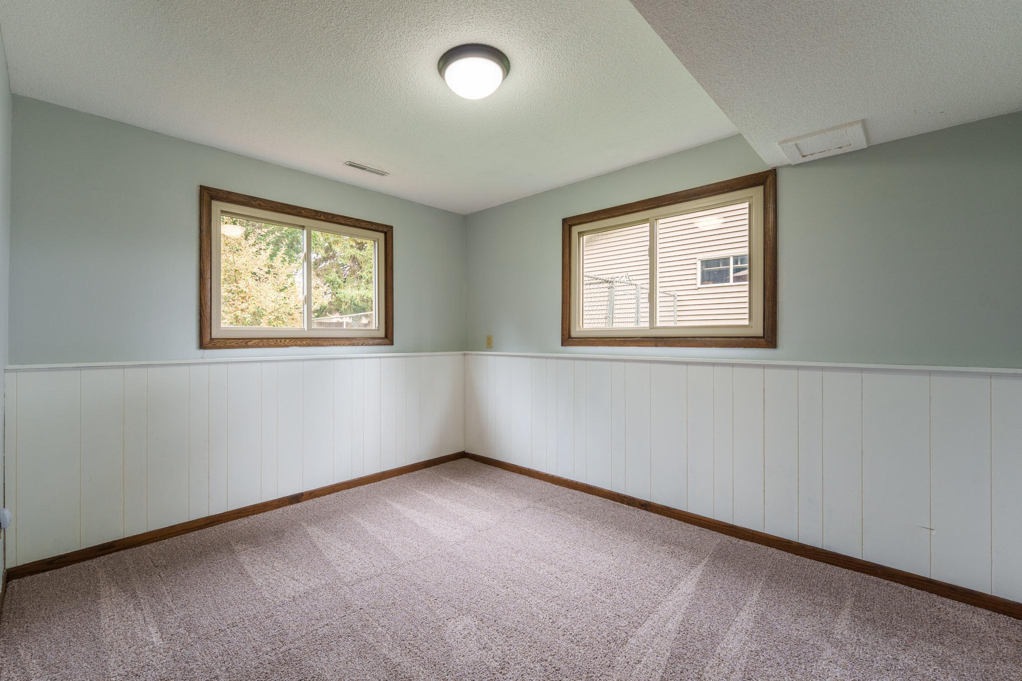 Bedroom 3 on the lower level. Dimensions are 11x9.75