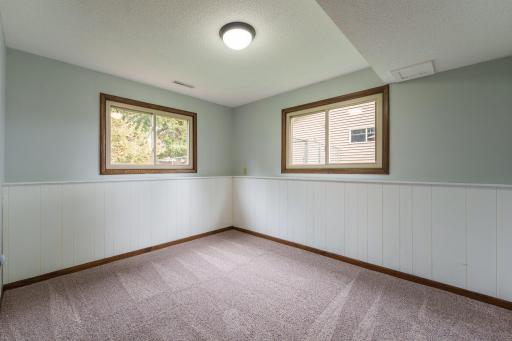 Bedroom 3 on the lower level. Dimensions are 11x9.75