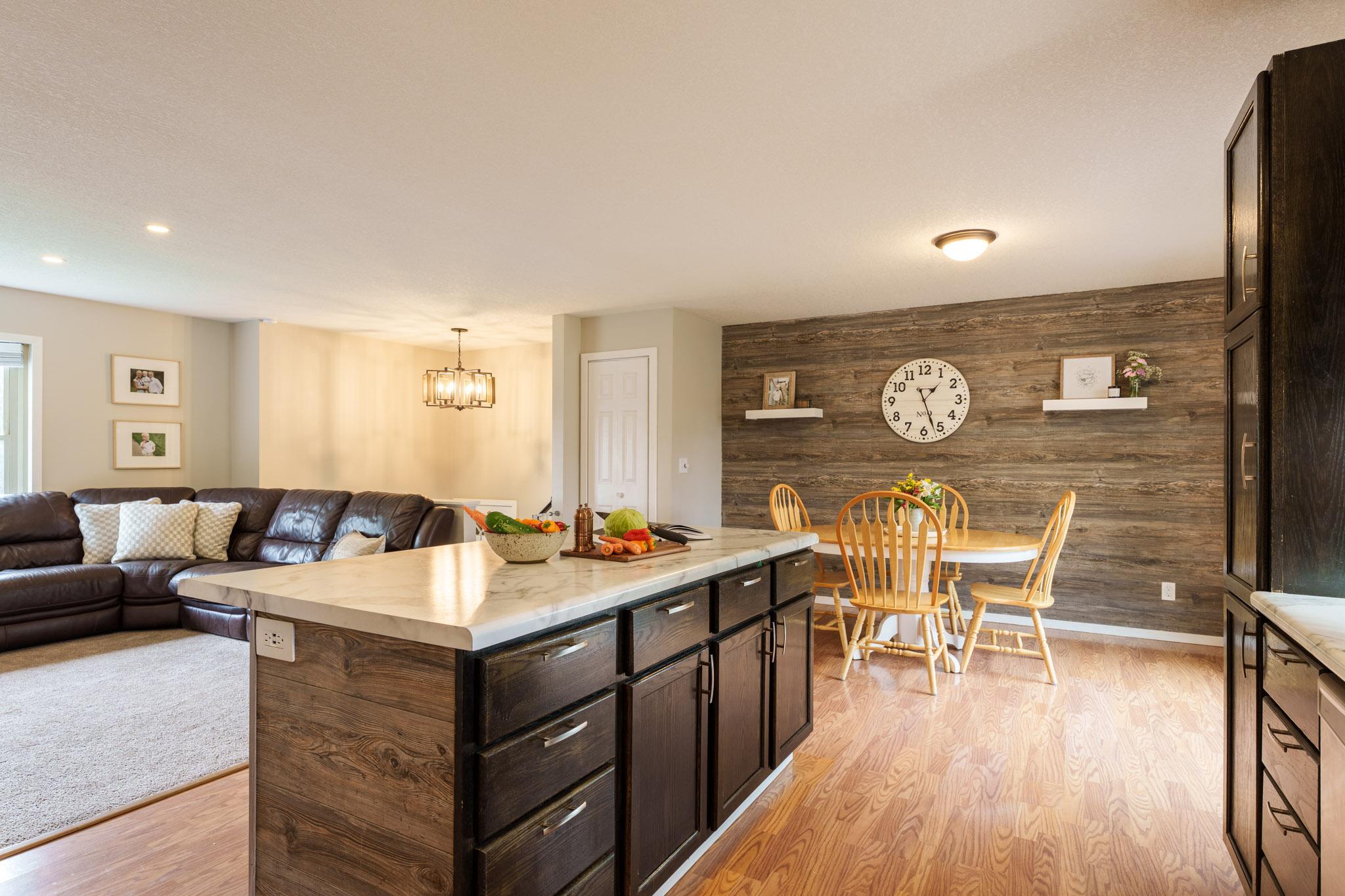 The open conept kitchen,dining room, and living room makes this space perfect space for entertaining!
