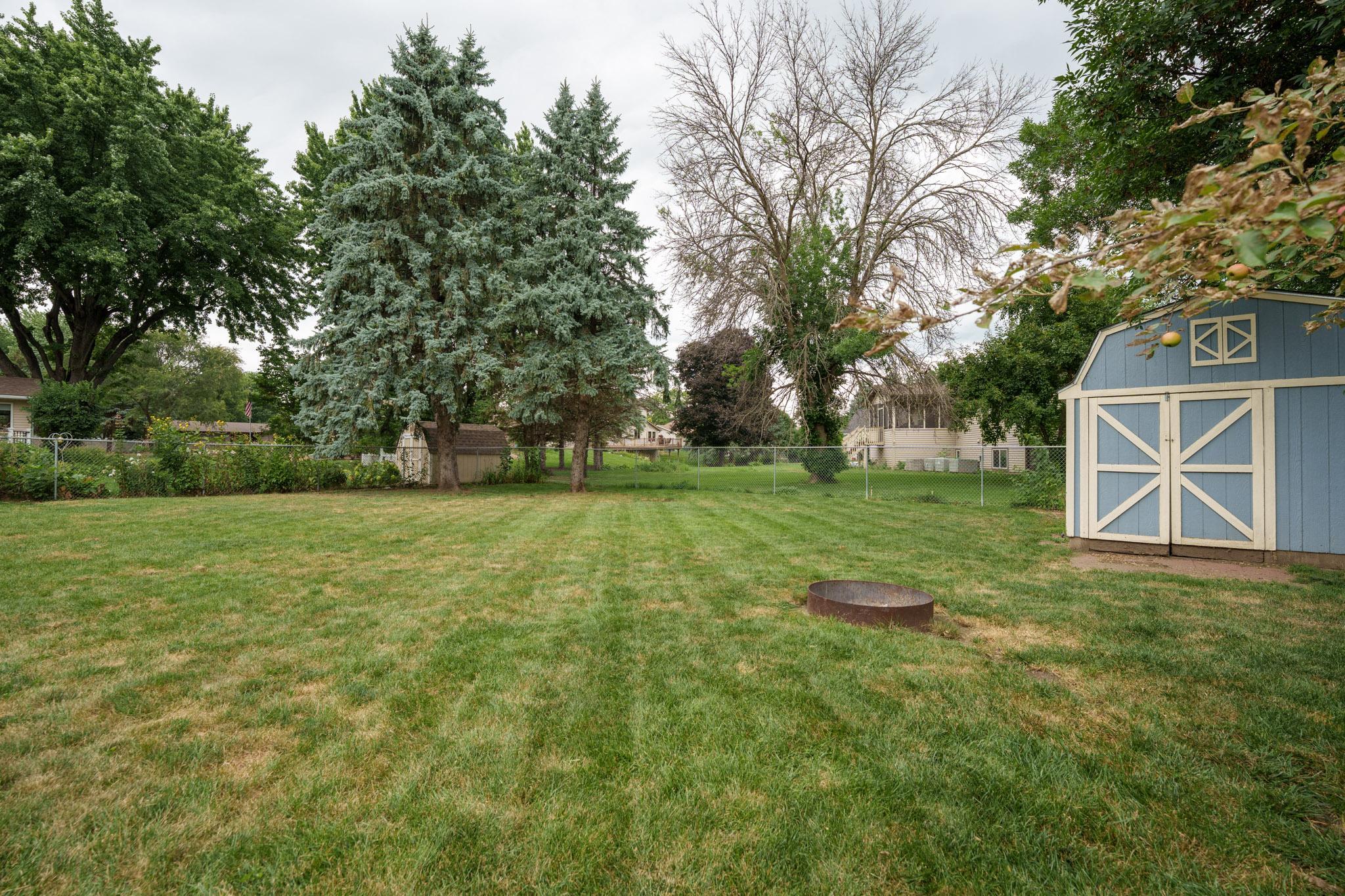 The backyard is fully fenced and ready for kids or pets to roam freely!