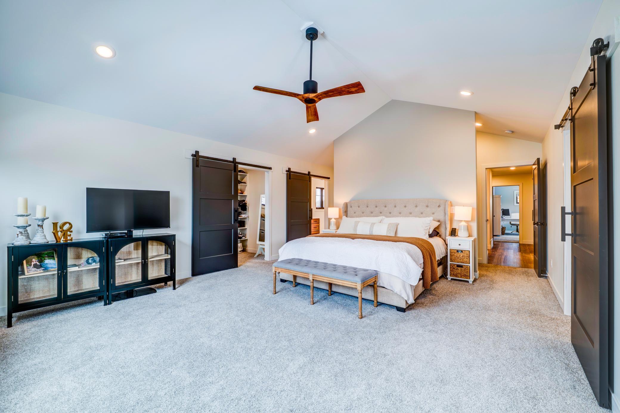 Spacious primary suite is a space for relaxation after a day on the water.