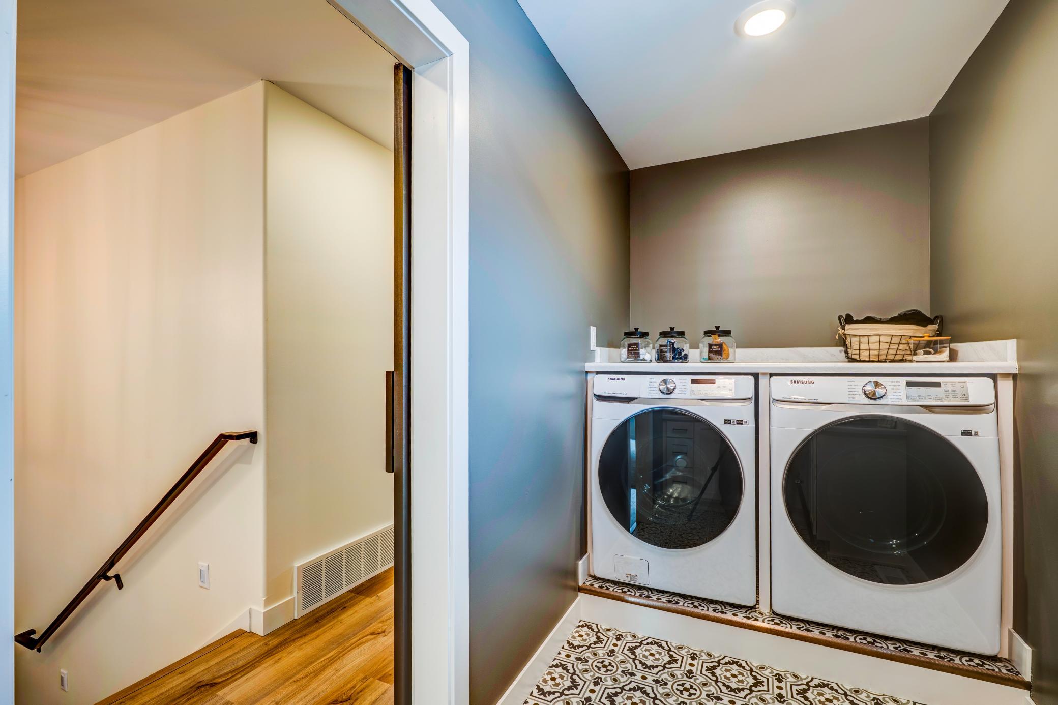 The laundry room is on the same floor as all 3 bedrooms.
