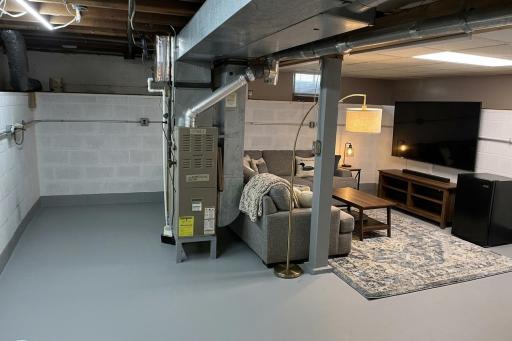 AI photo staged of basement family room without office (scenario 2)