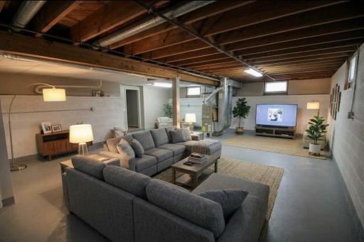 Another AI photo staged of what can be done with the basement. (scenario 5)