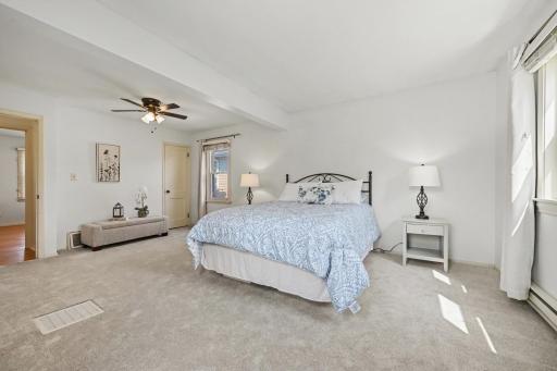 Primary bedroom is huge! There's enough space for a lounging area, or a work from home office here.