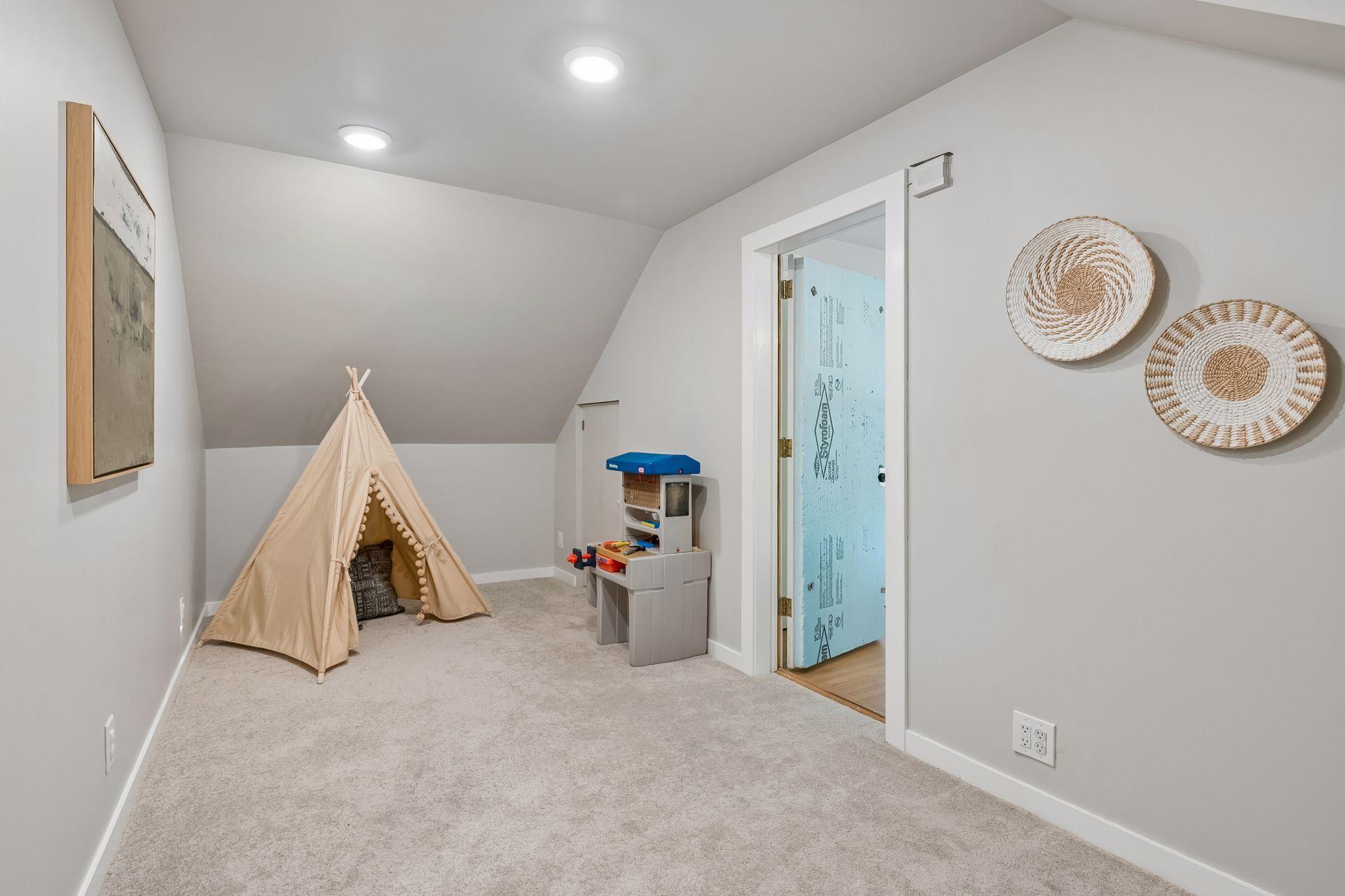 Bonus room off the 3rd bedroom on this level. Newly finished!