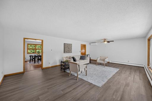 Spacious and so many different room options for this space, could divide into a couple different spaces/zones; toy room area or reading area, dining area, so much space the door to the left goes down the hall to the 4 bedrooms & full bath.