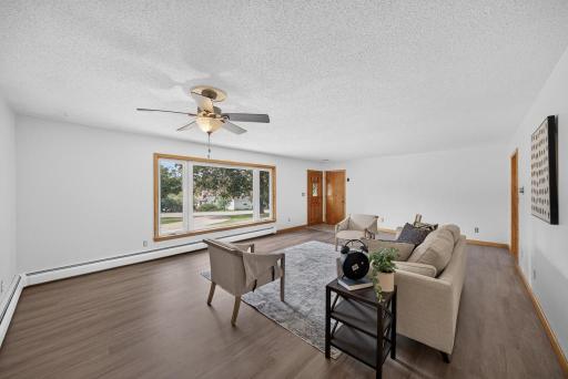 The property is off of 20th, a corner lot that is set back and snuggled amongst mature trees and circle drive that all add to the great curb appeal that this newly sided and newly roofed home nestled on almost a 1/2 acre provide